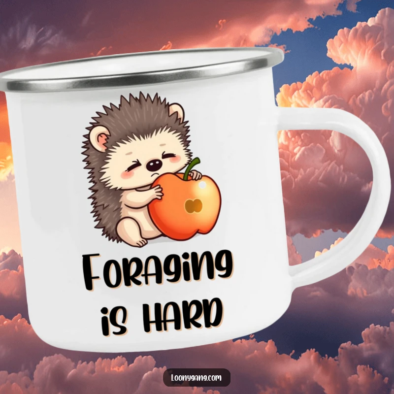 Funny hedgehog cub looking comically bewildered while balancing an apple, designed for durable outdoor camping mugs.