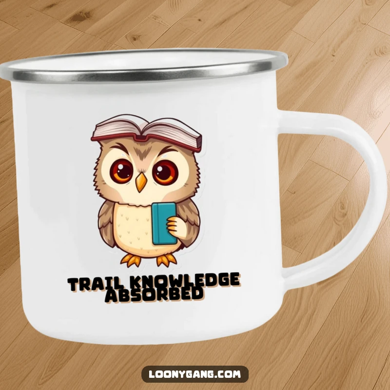 A sturdy camping mug featuring a funny, bewildered owl cub with a book perched on its head, ready for outdoor study.