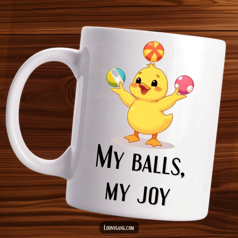 Funny yellow duckling mug showing a cheerful baby duck juggling colorful balls with impressive skill and a happy expression. A cute gift.