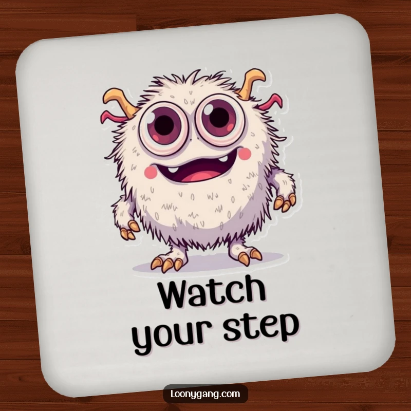Funny fuzzy monster with too many eyes comically tripping over its feet, guarding your drinks on this humorous coaster.
