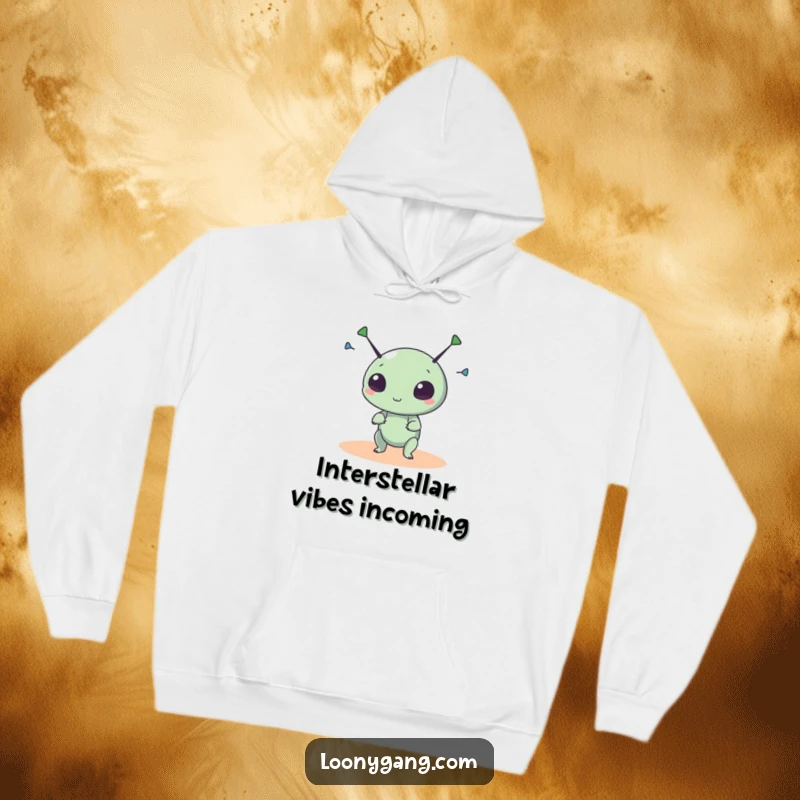 Funny alien hoodie featuring a small, round creature with wild antennae, embodying playful cosmic vibes and warmth.