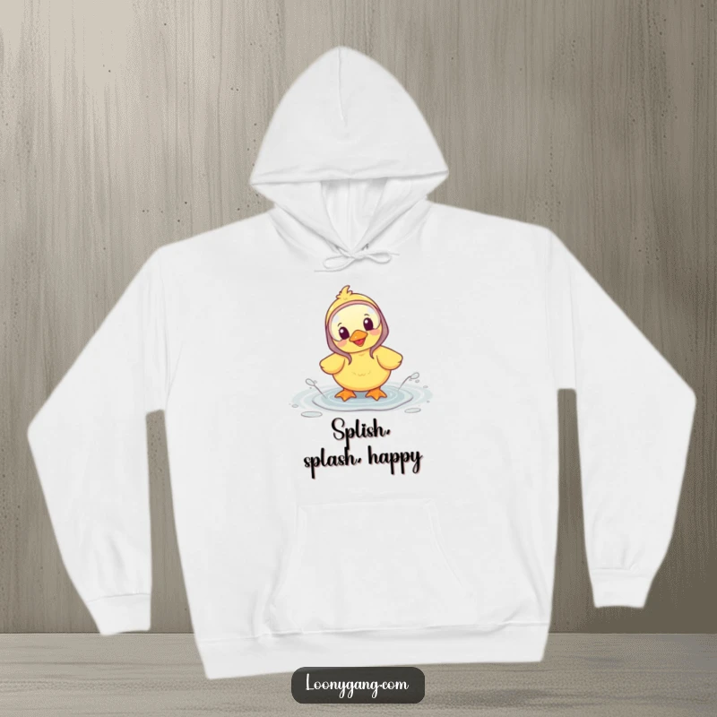 Funny hoodie featuring a happy duckling wearing galoshes and splashing in a puddle, perfect for cozy fun.
