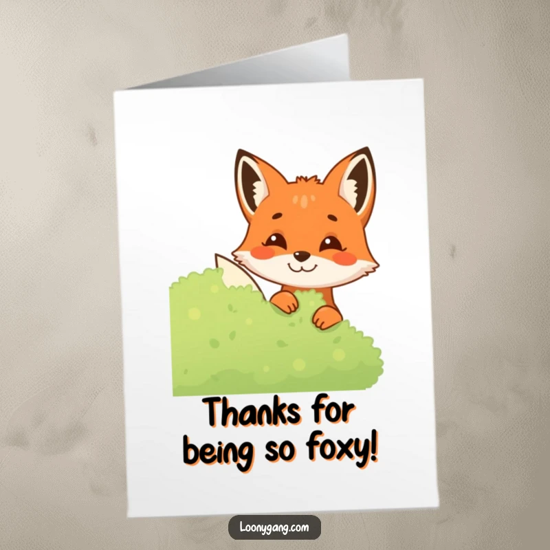 Funny Free Printable Thank You Card: A mischievous fox peeks from behind a bush, revealing a cunning grin.