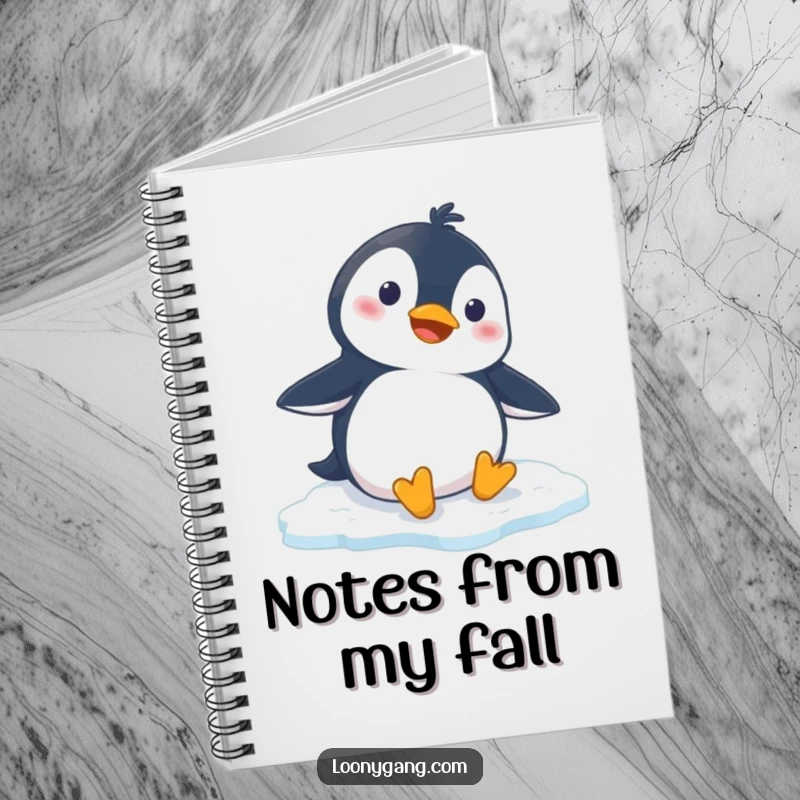 Funny penguin notebook with a cartoon penguin comically slipping on ice, ideal for capturing funny notes and ideas.