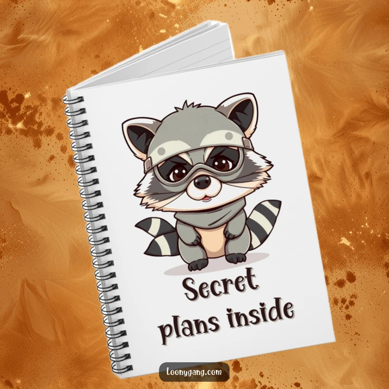 Funny raccoon notebook featuring a giggling raccoon wearing a bandit mask, great for notes.