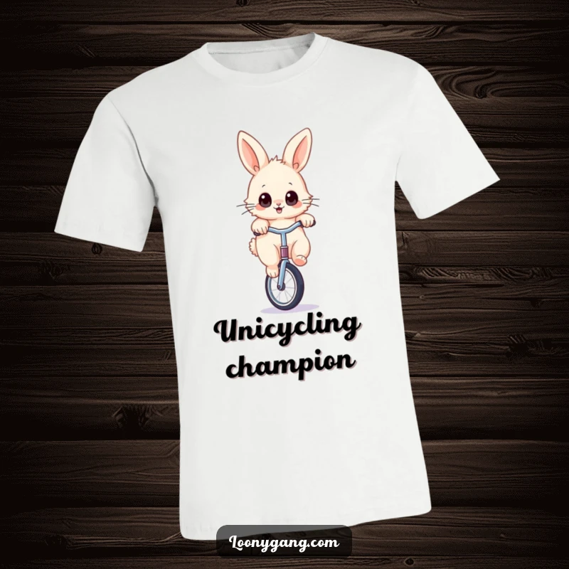 Funny rabbit unicycle t-shirt with a fluffy bunny, wide-eyed, balancing comically on a unicycle, for playful style.