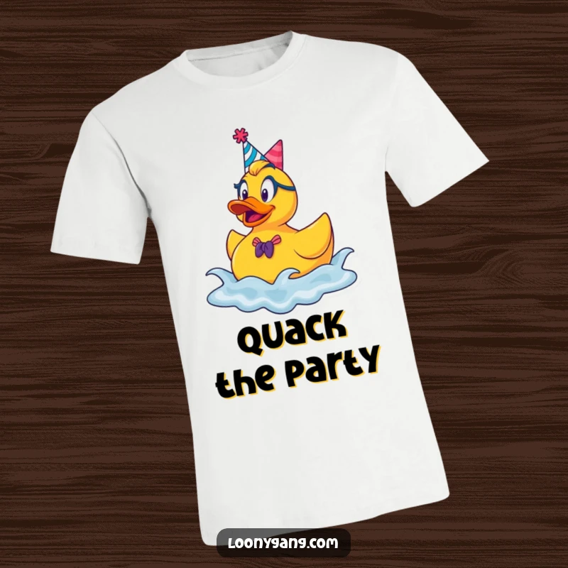 Funny rubber ducky t-shirt, a goofy character in a party hat, energetically bouncing on playful waves.