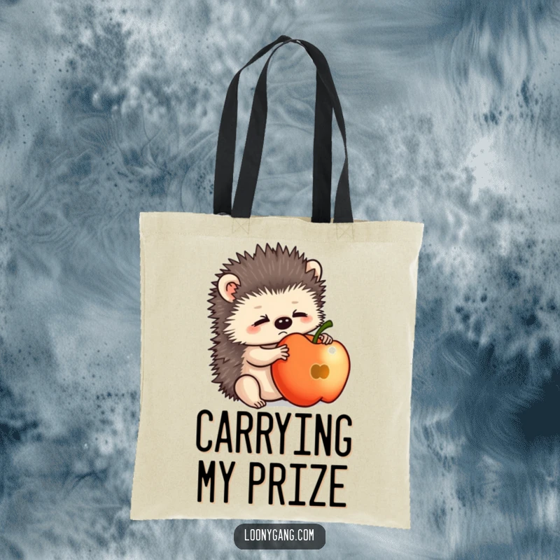 Funny hedgehog cub attempting to balance a large apple, looking slightly overwhelmed on this durable tote bag.
