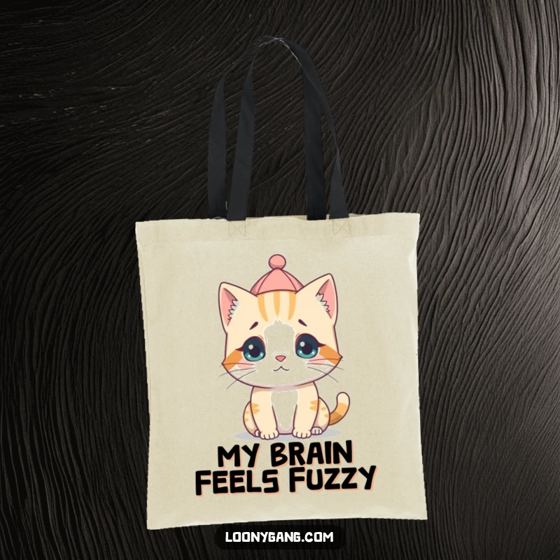 A durable tote featuring a funny, confused kitten cub wearing a tiny hat backward, looking endearingly lost.