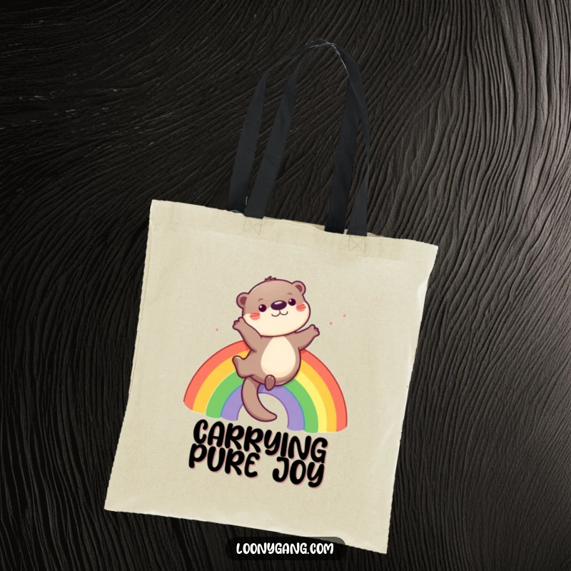 Funny otter tote bag featuring a playful otter sliding down a rainbow, ideal for carrying daily items.