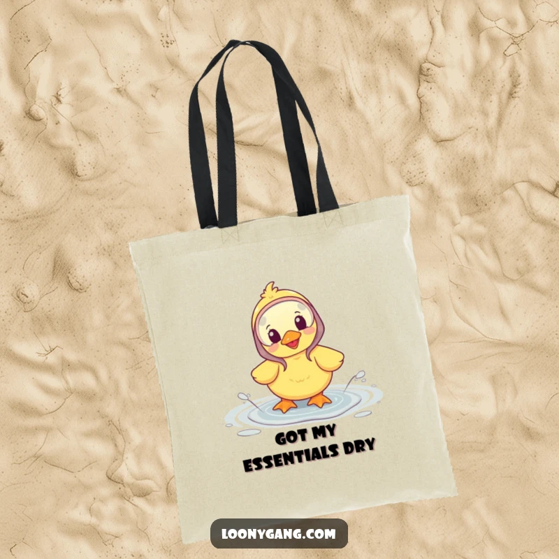 Funny tote bag featuring a happy duckling wearing galoshes and splashing in a puddle, perfect for errands.
